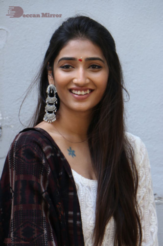 Telugu Actress Priya Vadlamani in a white salwar dress