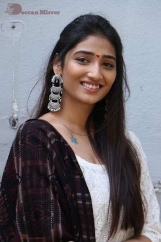 Telugu Actress Priya Vadlamani in a white salwar dress