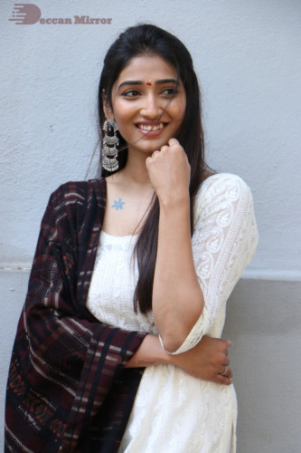 Telugu Actress Priya Vadlamani in a white salwar dress