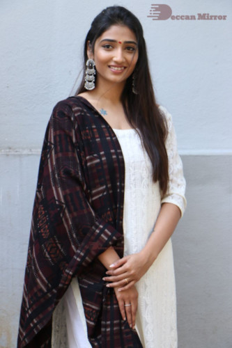 Telugu Actress Priya Vadlamani in a white salwar dress