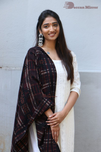 Telugu Actress Priya Vadlamani in a white salwar dress