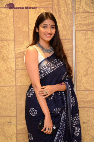 Telugu Actress Priya Vadlamani looks stunning in a blue saree