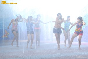 Actress Priyamani glamorous pictures in rain wearing a blue mini skirt