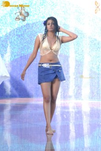 Actress Priyamani glamorous pictures in rain wearing a blue mini skirt