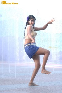 Actress Priyamani glamorous pictures in rain wearing a blue mini skirt