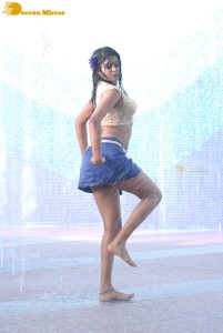 Actress Priyamani glamorous pictures in rain wearing a blue mini skirt