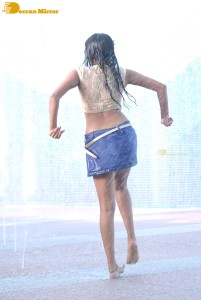 Actress Priyamani glamorous pictures in rain wearing a blue mini skirt