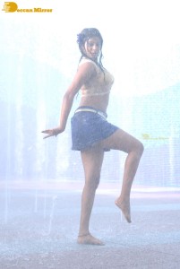 Actress Priyamani glamorous pictures in rain wearing a blue mini skirt