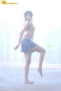 Actress Priyamani glamorous pictures in rain wearing a blue mini skirt