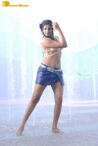 Actress Priyamani glamorous pictures in rain wearing a blue mini skirt