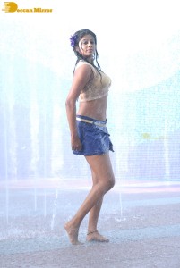 Actress Priyamani glamorous pictures in rain wearing a blue mini skirt