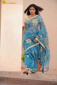 Telugu and Tamil Actress Priyamani in a blue saree during filming