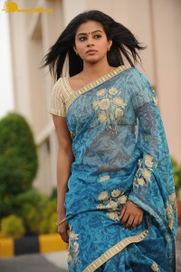 Telugu and Tamil Actress Priyamani in a blue saree during filming