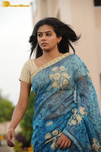 Telugu and Tamil Actress Priyamani in a blue saree during filming