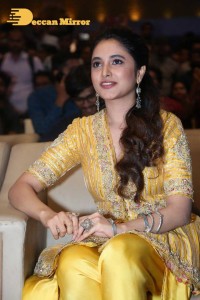Actress Priyanka Arul Mohan in a yellow dress while attending a movie event