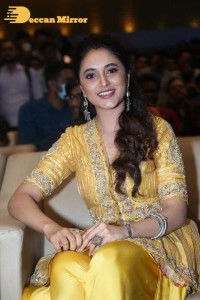 Actress Priyanka Arul Mohan in a yellow dress while attending a movie event