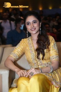 Actress Priyanka Arul Mohan in a yellow dress while attending a movie event