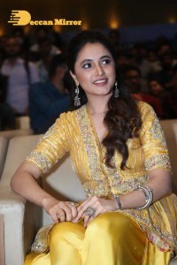 Actress Priyanka Arul Mohan in a yellow dress while attending a movie event