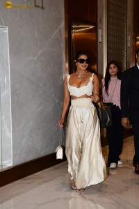 actress Priyanka Chopra red-hot looks in a low-cut white blouse
