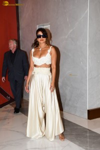 actress Priyanka Chopra red-hot looks in a low-cut white blouse