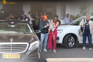 Priyanka Chopra and Nick Jonas at Kalina Airport with their daughter Malti Marie Chopra Jonas