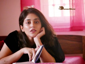 Actress Priyanka Jawalkra posing for a Photoshoot in Black Saree