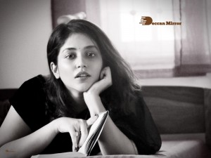 Actress Priyanka Jawalkra posing for a Photoshoot in Black Saree