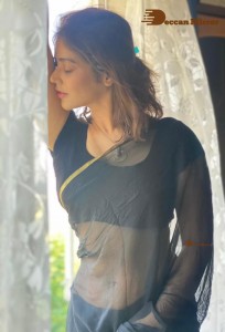 Actress Priyanka Jawalkra posing for a Photoshoot in Black Saree