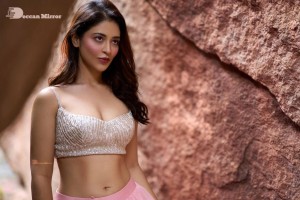 Actress Priyanka Jawalkar poses poses for pictures in a silver color Choli and Pink Lehenga