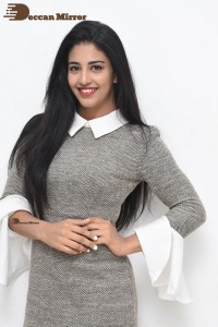 Priyanka Jawalkar in a Grey Dress with White Collar and Cuffs