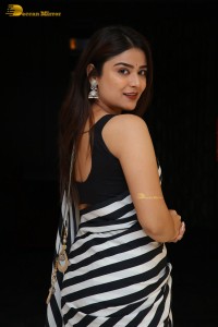 Tollywood Actress Priyanka Sharma in a black and white saree