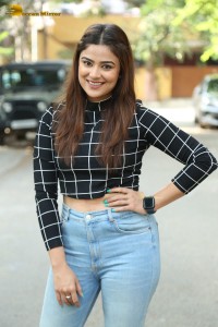Actress Priyanka Sharma in a black shirt and denim jeans