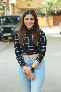 Actress Priyanka Sharma in a black shirt and denim jeans