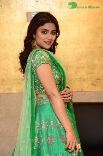 Bollywood and Telugu Cinema Actress Priyanka Sharma in a green dress