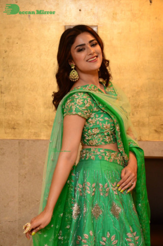 Bollywood and Telugu Cinema Actress Priyanka Sharma in a green dress