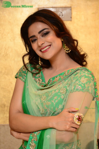 Bollywood and Telugu Cinema Actress Priyanka Sharma in a green dress