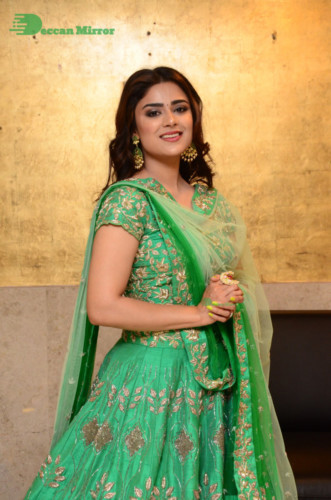 Bollywood and Telugu Cinema Actress Priyanka Sharma in a green dress