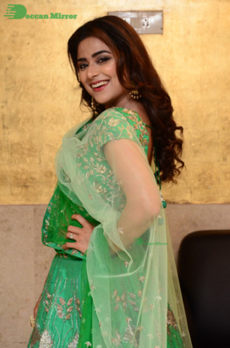 Bollywood and Telugu Cinema Actress Priyanka Sharma in a green dress