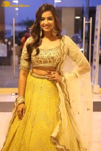 Actress Pujita Ponnada in a yellow dress while attending a movie function