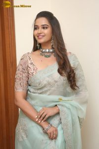 actress Pujita Ponnada ravishing in a transparent green saree