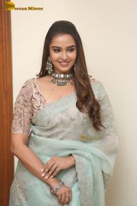 actress Pujita Ponnada ravishing in a transparent green saree