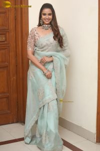 actress Pujita Ponnada ravishing in a transparent green saree