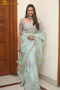 actress Pujita Ponnada ravishing in a transparent green saree