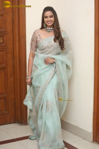 actress Pujita Ponnada ravishing in a transparent green saree