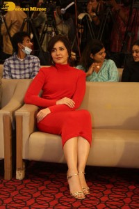 Raashi Khanna in a red dress while attending the press meet of the movie Pakka Commercial
