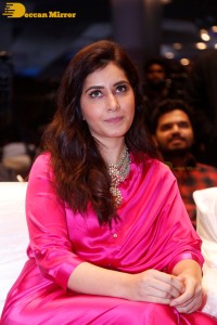 Raashi Khanna in a pink dress during a press meet