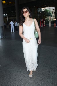 actress Raashi Khanna in a white dress spotted at mumbai airport