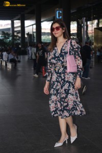 actress raashi khanna fabulous looks in a floral dress at mumbai airport