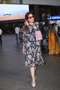 actress raashi khanna fabulous looks in a floral dress at mumbai airport
