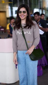 actress raashi khanna beautiful in a t-shirt and sunglasses